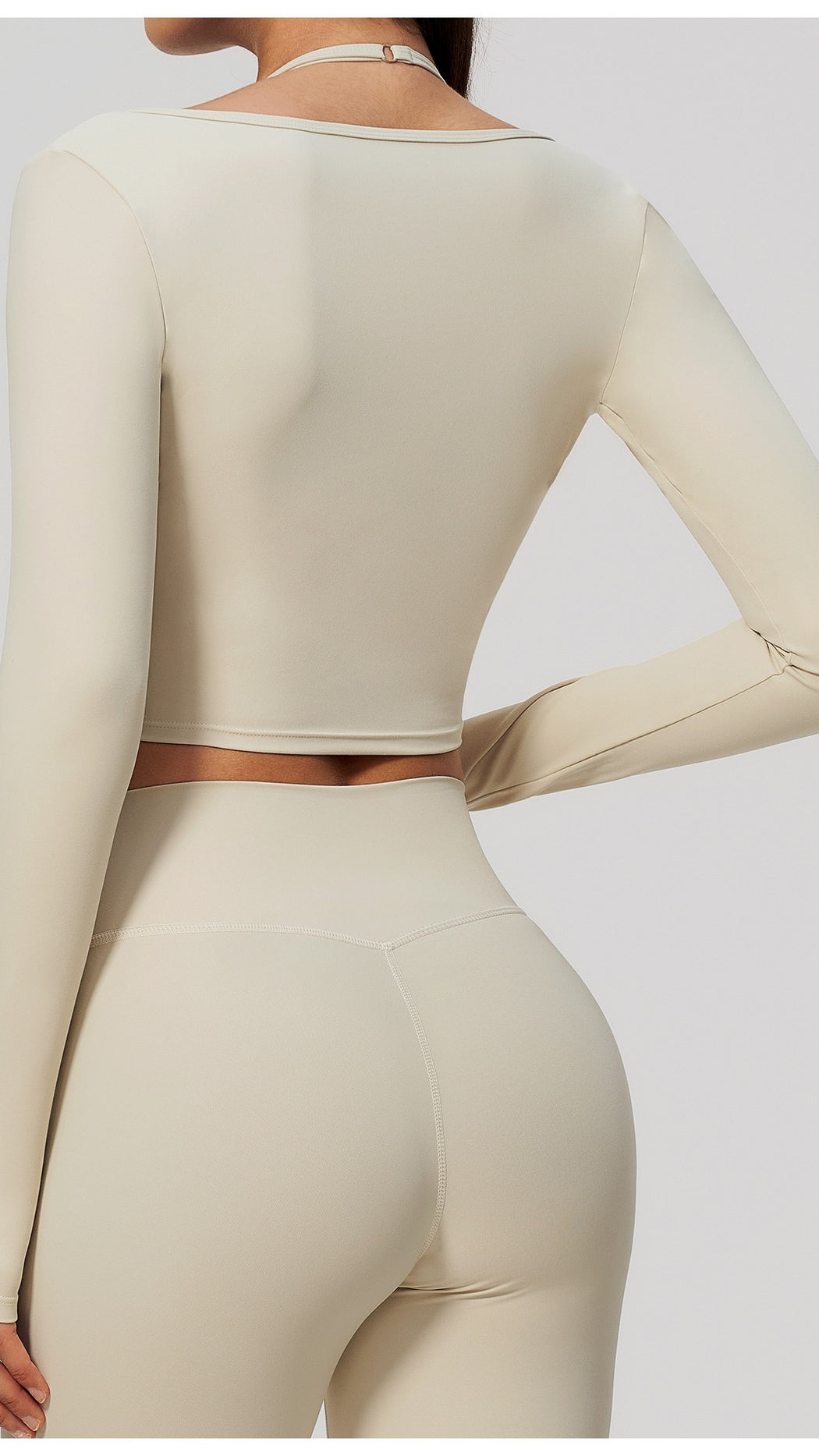 KAIA Brushed Nylon Twist-Front Long-Sleeve Crop Top